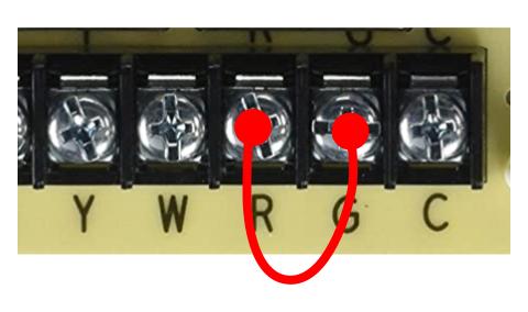 Jump the R and G terminals together on a furnace control board to override the fan to run