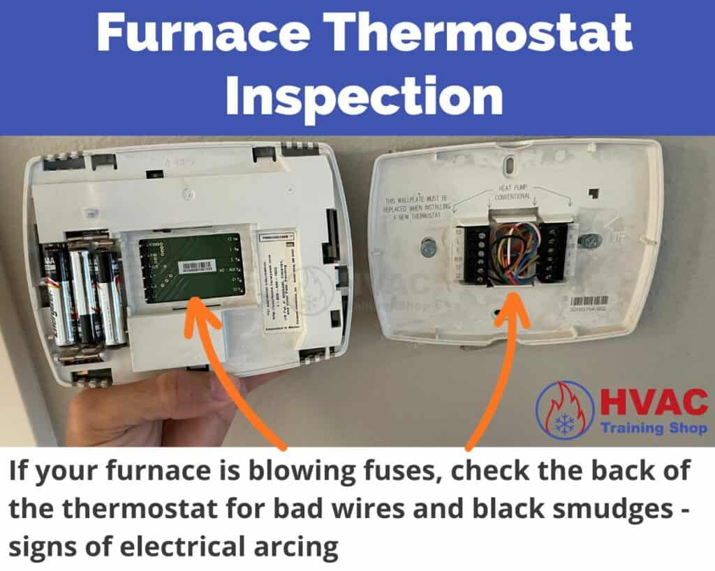 If your furnace is blowing fuses, inspect the back of the thermostat for bad wires or signs of electrical arcing